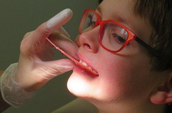 Осмотр стоматолога